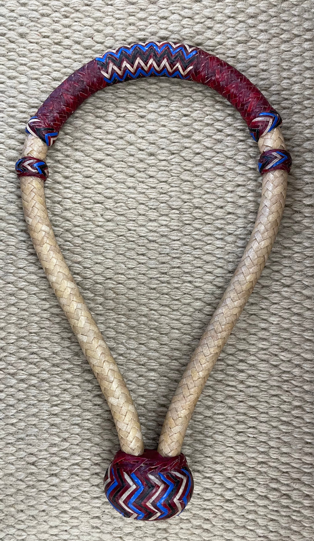 Bosal - B97 - 5/8” 16 Plait Natural Rawhide w/ Burgundy, Blue Accents and Spacer