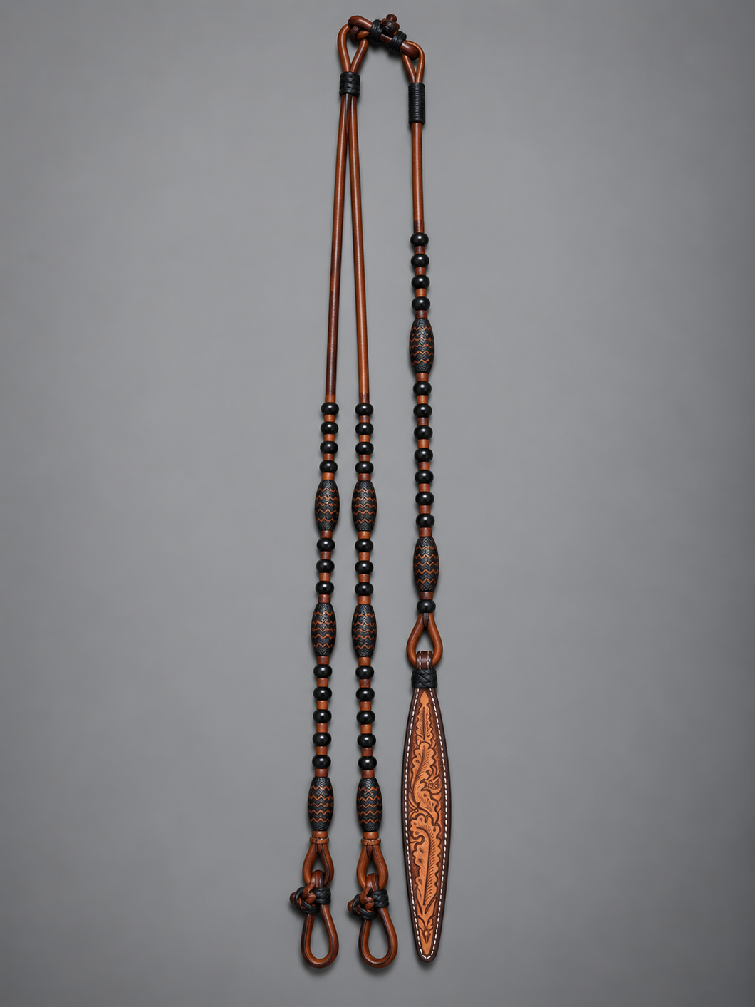 Romal Reins - RR22 - TRB 18 Plait George Moore Caramel with Black Knots and Accents 102